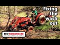 Repairing the creek bank with our KIOTI tractor