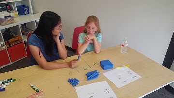 Video Example: A tutor uses concrete manipulatives to solve a subtraction problem with a student