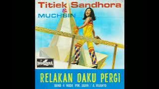 TANTE CEREWET TITIEK SANDHORA