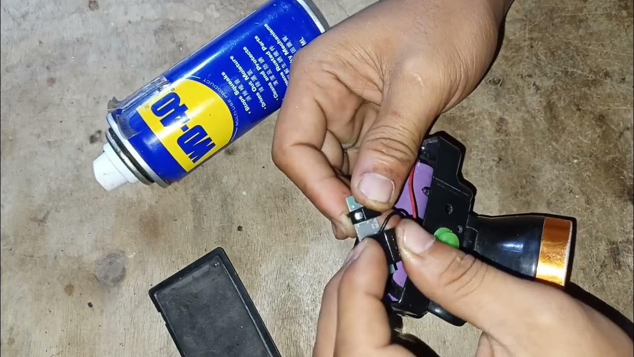 How to repair flashlight switch? Button switch problem Use WD40 to