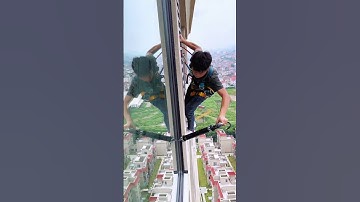 Sealing window frames for maximum protection. #buildingsafety #precisionwork #shorts