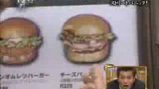 Magican conjures burger up an eats them