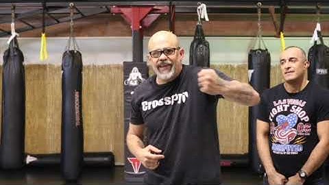 Left Hook... thumb up or in?