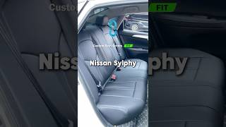 EKR custom black rear seat cover for the Nissan Sentra installation