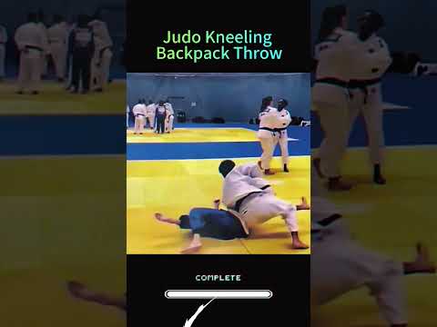 Master the Kneeling Backpack Throw with These Combat Skills #boxing #fighting