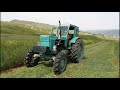Трактор Т-40 косит траву с помощью косилки.Сила трактора!