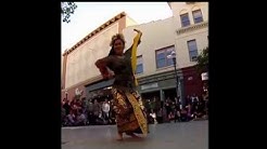 A dancer performing a traditional Balinese dance.