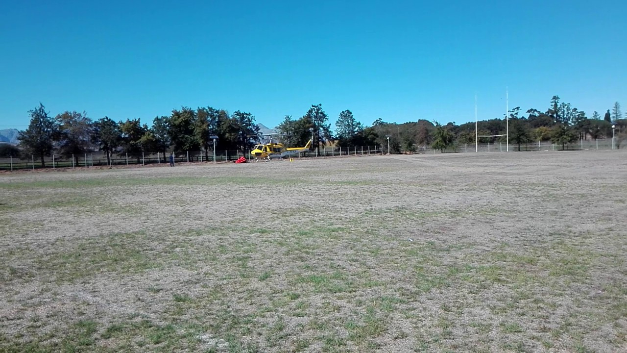 Huey helicopter take off. Working On Fire