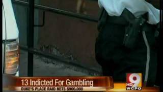 13 indicted after gambling house raid