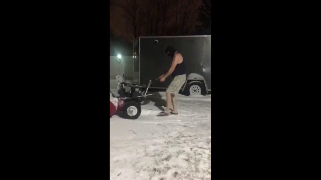 ⁣Guy thinks he is tough clearing snow dressed like this