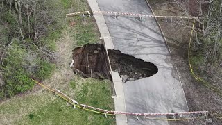 Sinkhole opens in Urbandale, blocks road outside apartment complex