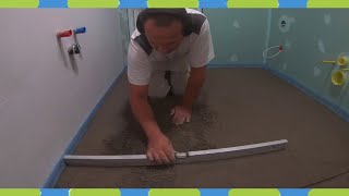 Lay the bathroom screed and tile the floor + drill the core hole