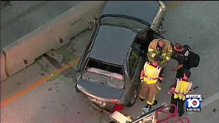 Woman fatally struck by car after stepping out of disabled vehicle; Boy injured in crash