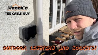 Installing outdoor lighting and sockets.