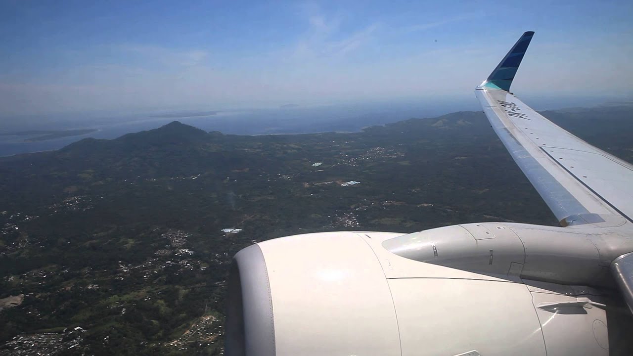 Garuda Indonesia PK-GNL takeoff from Sam Ratulangi Airport in Manado