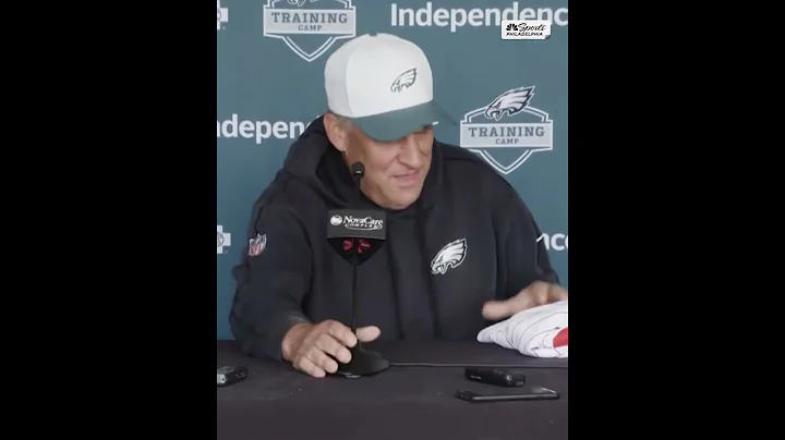 Vic Fangio shows off his Dick Allen jersey