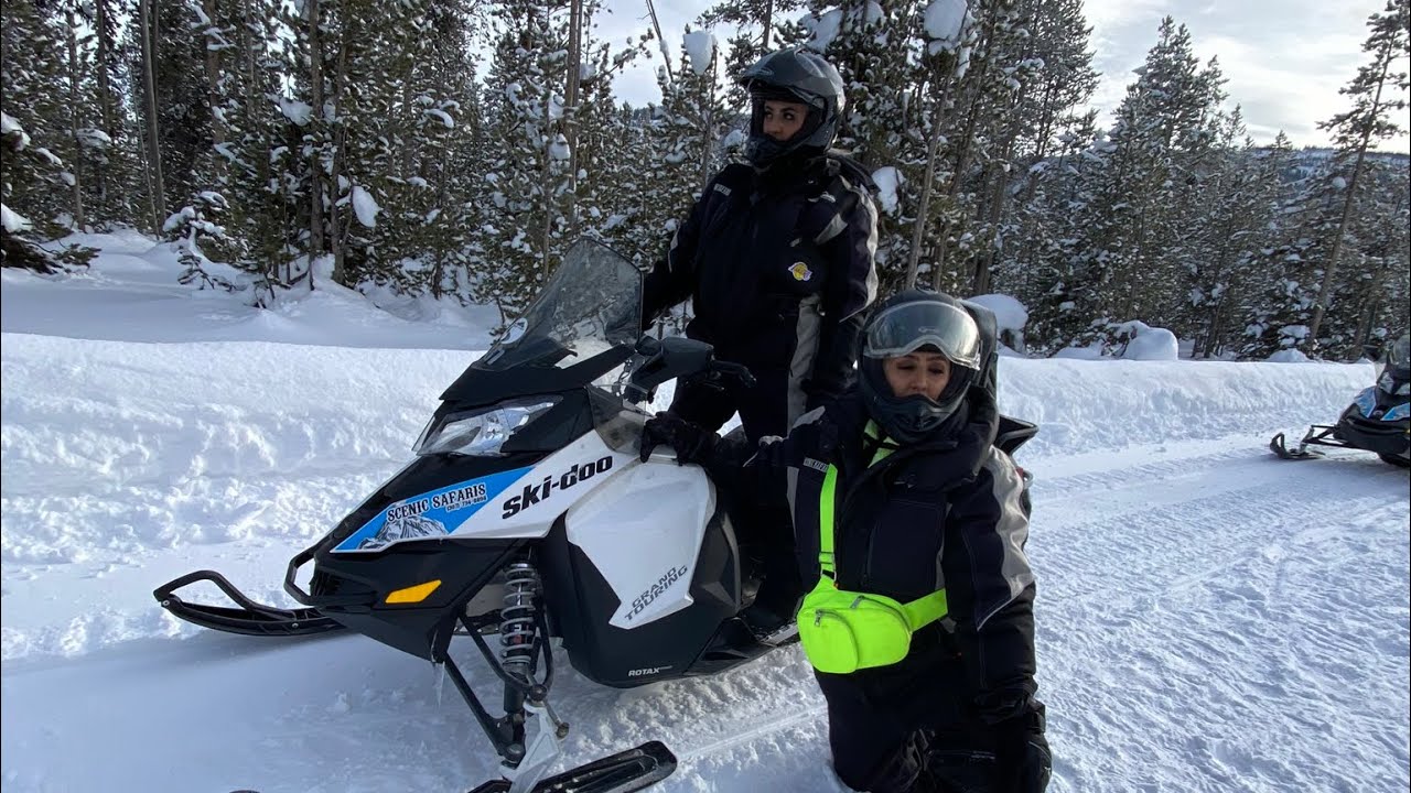 RIDING SNOW MOBILES THROUGH YELLOWSTONE
