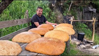 Life in the mountains. They made 50 kg of traditional Hutsul cows cheese. Ukrainian Carpathian