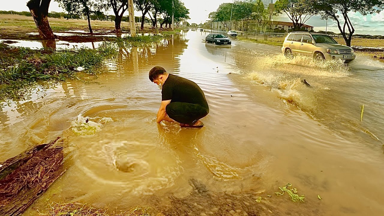 Flash Flood Defense Unclogging a Storm Drain for Safety and Peace of ...