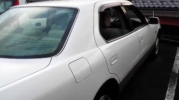 Doors and all windows open in the Lexus LS400 remote control key