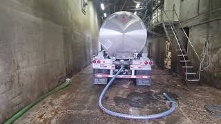 Washing out a chemical tanker at the Lancaster, PA Tank Wash. spinners, hot water & water treatment