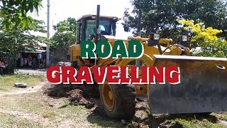 Road Gravelling in Parville-Hoa Prk.4 Bongbong Brgy. Mudiang Operating Heavy Equipment