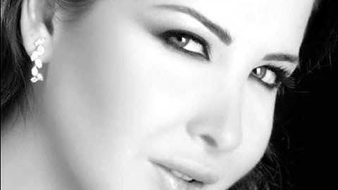 Wana Bein Edik Nancy Ajram w_ lyrics (+translation)jermy.flv