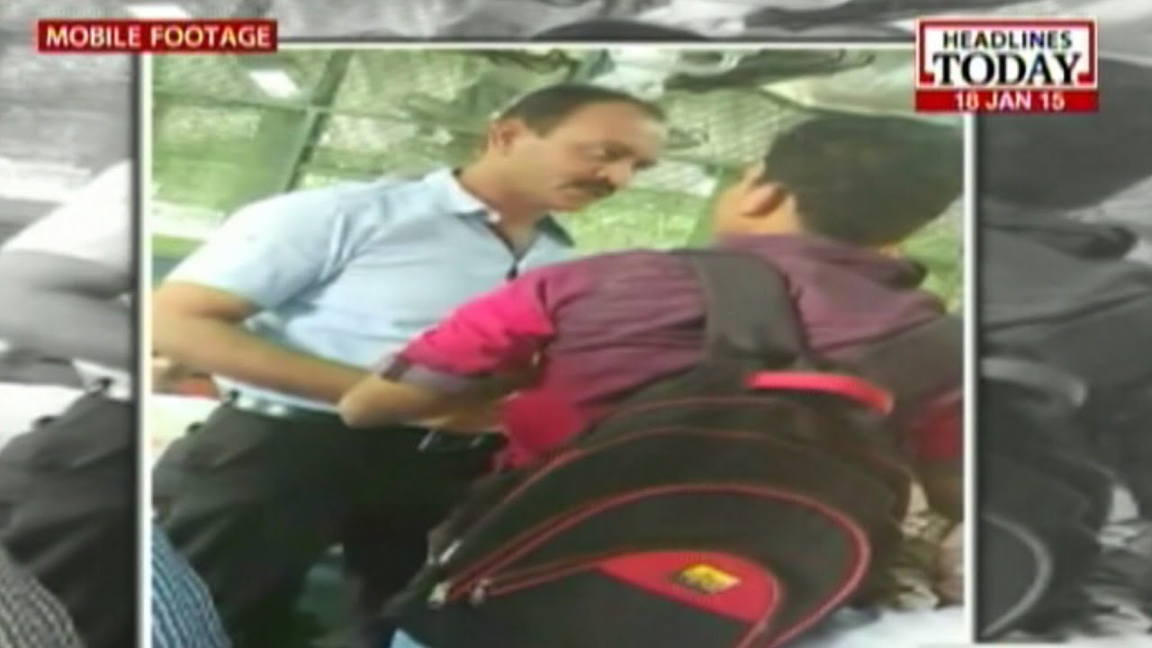 Train ticket checkers punch passenger in Mumbai local train