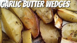 Making Garlic Butter Potato Wedges in the oven!