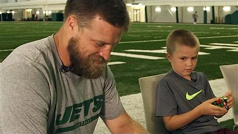 N.Y. Jets' Fitzpatrick & Son in Rubik's Cube Showd...