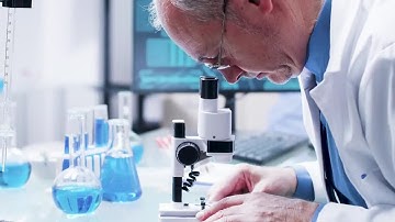 Scientist Using Microscope Stock Video
