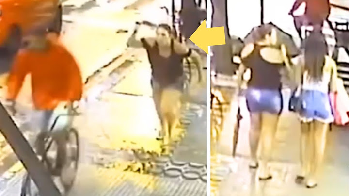 Thief Tries To Steal Daughter's Phone But Hero Mom Hits Him with big Umbrella