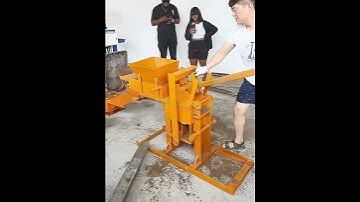 African client order small manual soil interlock brick making machine Lego clay brick making machine