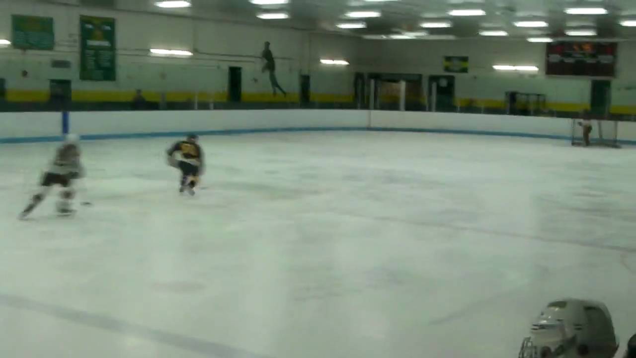 Emily Gotowala races down past her opponent and lifts it in to score her 21st of the season