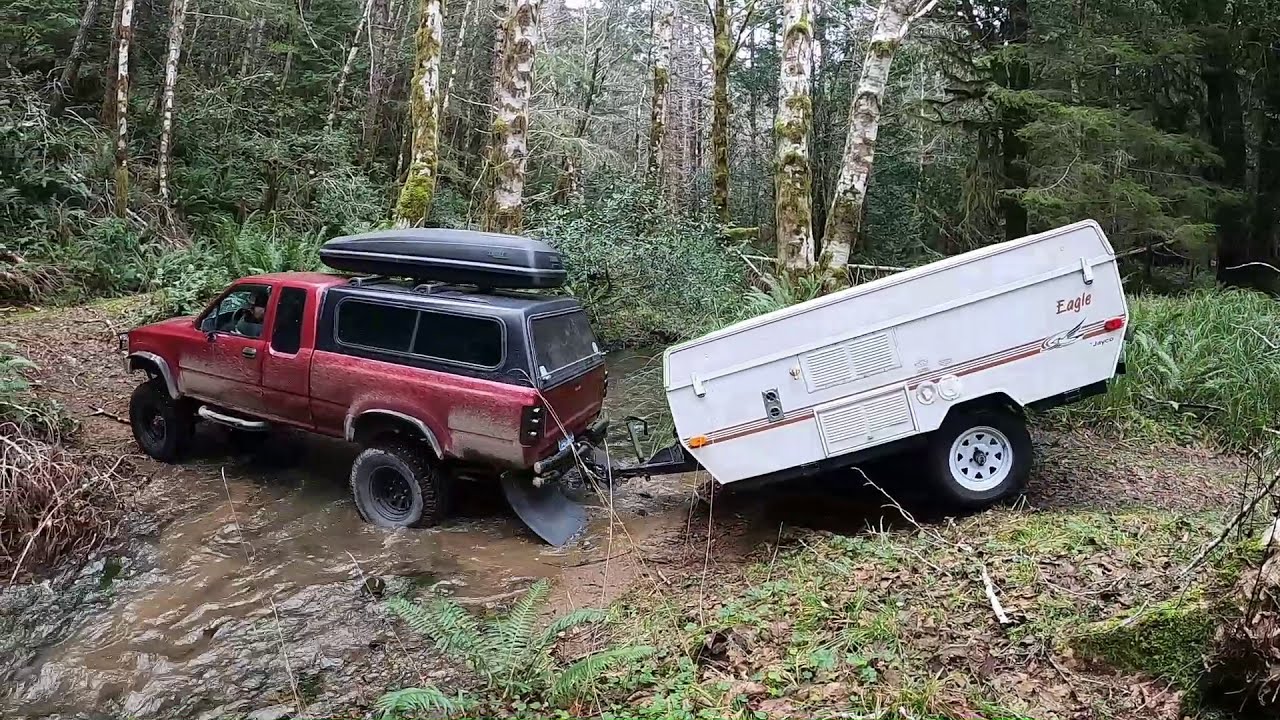 BOONDOCKING AT HIDDEN GEM MEADOW NEAR ELK RIVER OREGON -4wd Toyota pulls lifted pop up tent trailer