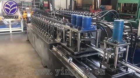 New design roller shutter door roll forming machine with punching Oval hole