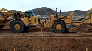 CAT 637E Scrapers push pull close up - Amazing Sound and Power