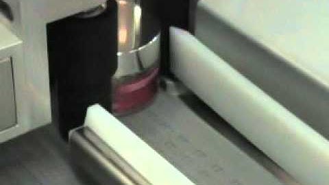 620TSE Automatic Trap & Wrap Style Round Product Labeling System