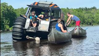 Sherp Stuck on WI River During Overnight Camping Trip with Kayaks and Canoes