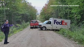 Maine Fed-Ex driver spends night in stuck truck