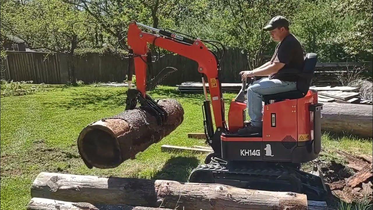Gardner's Groundhog Mini Excavator with Log Grabber - YouTube