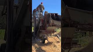 Case steam tractor running antique thrasher.