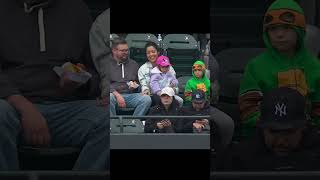 Kid in turtle costume gets foul ball and THROWS IT BACK!! ??