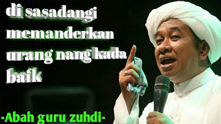 ceramah abah guru zuhdi tentang membicarakan orang lain