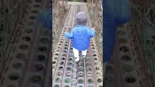 Baby walking on bridge! 🥳