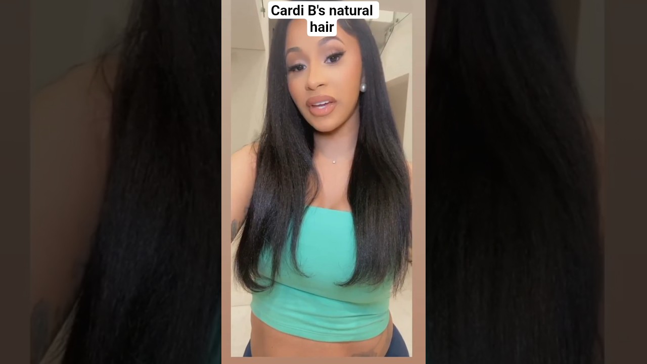 Cardi B showing off her natural hair after a silk press
