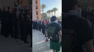 Protesters clash LAPD outside Pomona College Graduation