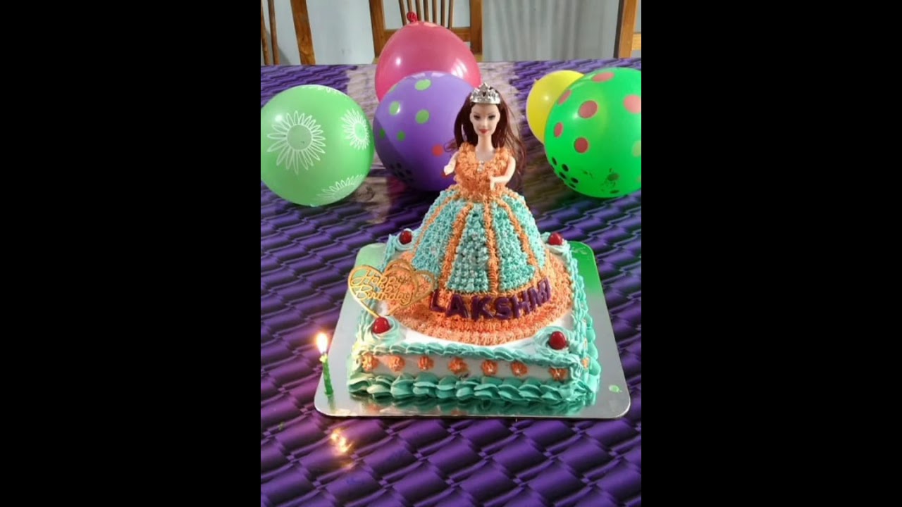 2 tier doll cake decoration  malayalam