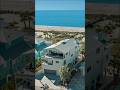Beach houses are some of our fav 😎🌊🏖️🏡