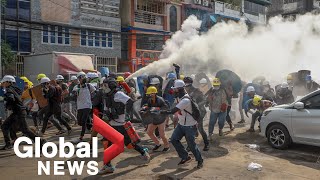 Myanmar coup: Protesters use smoke grenades, fire extinguishers for cover as crackdown continues